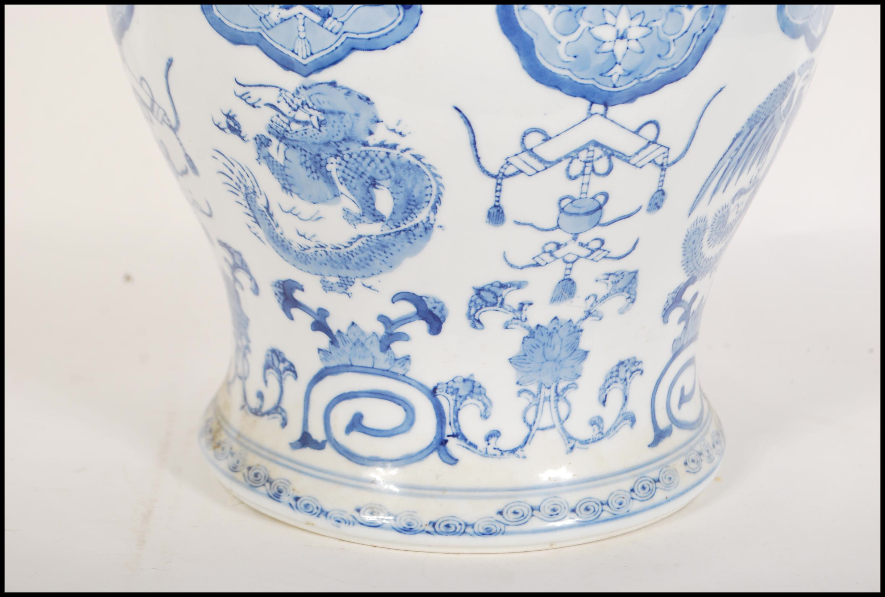 A tall 20th Century Chinese blue and white lidded - Image 4 of 9