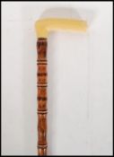 A 20th Century bone handle walking stick cane havi