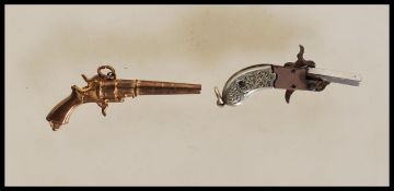 A 19th Century German miniature firing cap gun / p