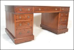 A late 19th century Victorian mahogany twin pedest