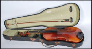 A 20th Century Violin musical instrument having a