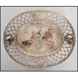 A 19th Century continental silver dish having rais