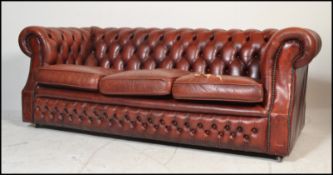 A 20th century Oxblood leather chesterfield button