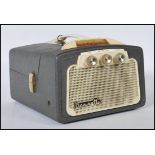 A vintage 20th Century Dansette TRG 45 portable battery operated MW-LW radio receiver 7" record