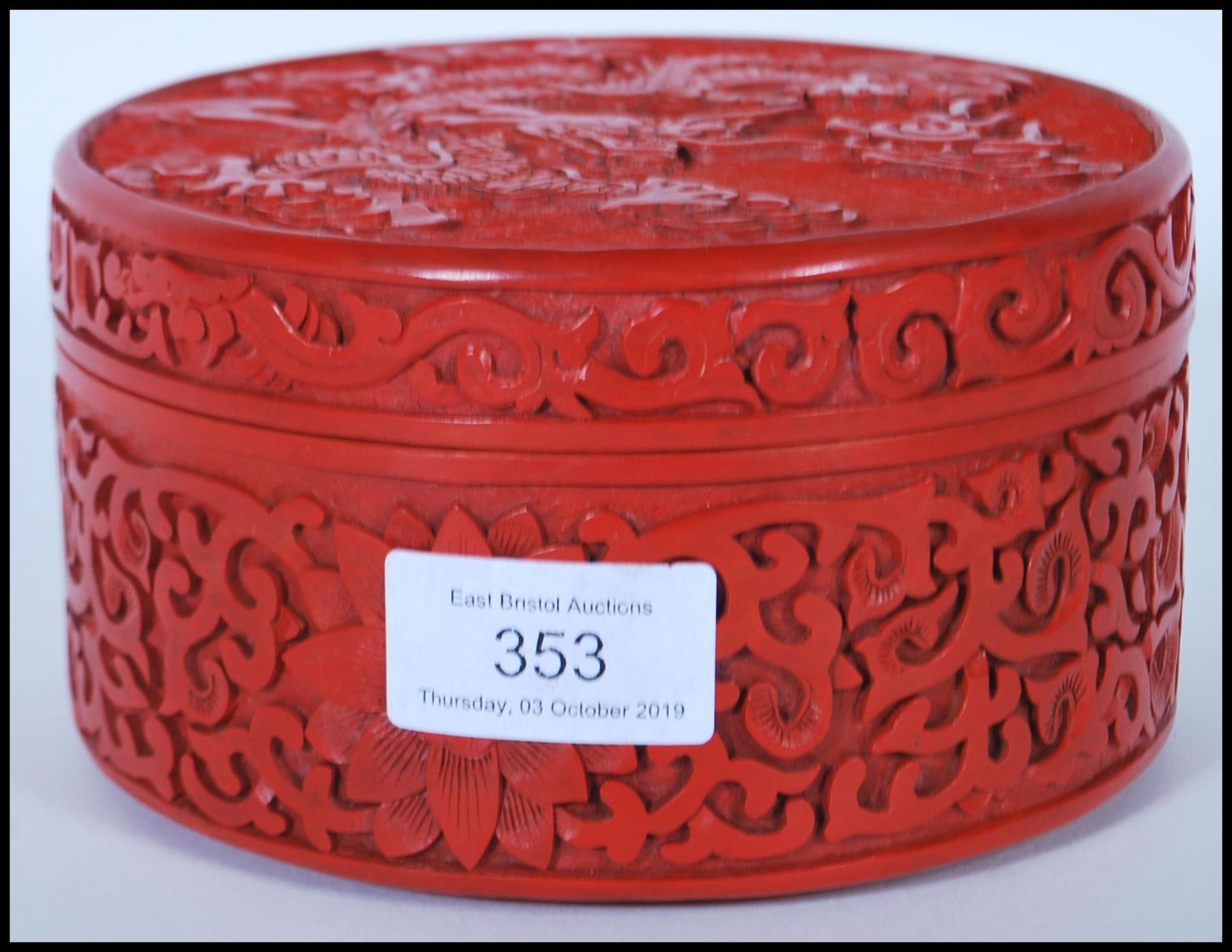 A 20th Century Chinese Cinnabar round desk top box of round form having carved relief of a Chinese - Image 4 of 7