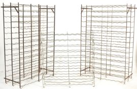 A good pair of French Rigidex 20th century cast iron / wrought metal wine rack cages to include 2 of