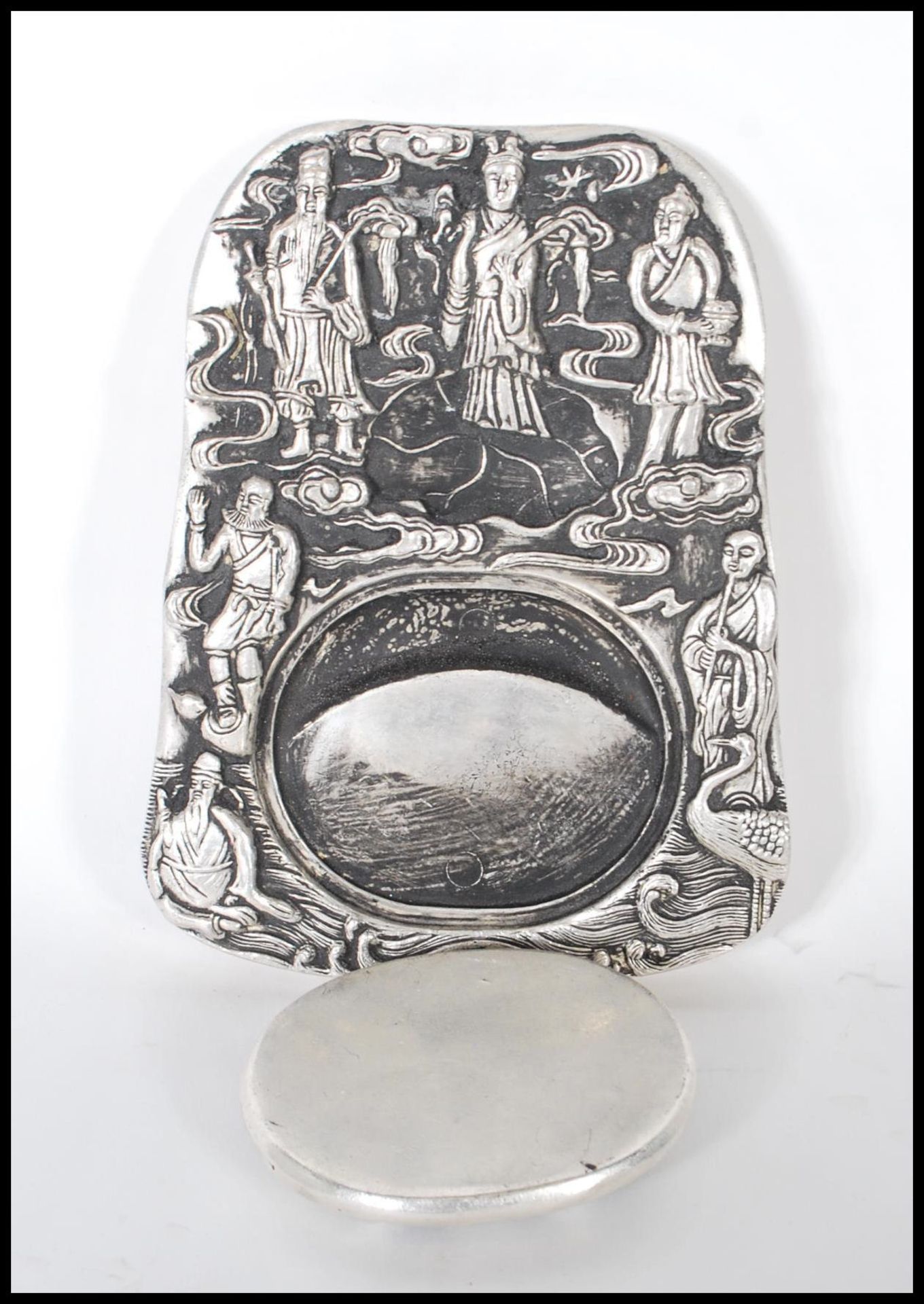 A Chinese white silver inkwell of ingot form, cast in relief with elders and Crane's central - Image 4 of 6