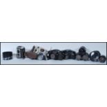 A collection cameras and lens to include makes and models form Sigma Mirror-Telephoto Multi-Coated