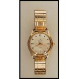 A mid 20th Century 17 jewels Smiths De Luxe 9ct gold gentlemen's wrist watch on a 9ct gold metal