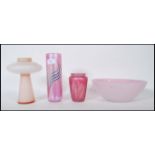 A selection of 20th Century vintage retro studio glass to include two pink iridescent vases in the