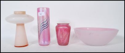 A selection of 20th Century vintage retro studio glass to include two pink iridescent vases in the