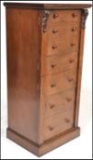 A good quality antique style mahogany Wellington chest - drink - entertainment cabinet. Raised on