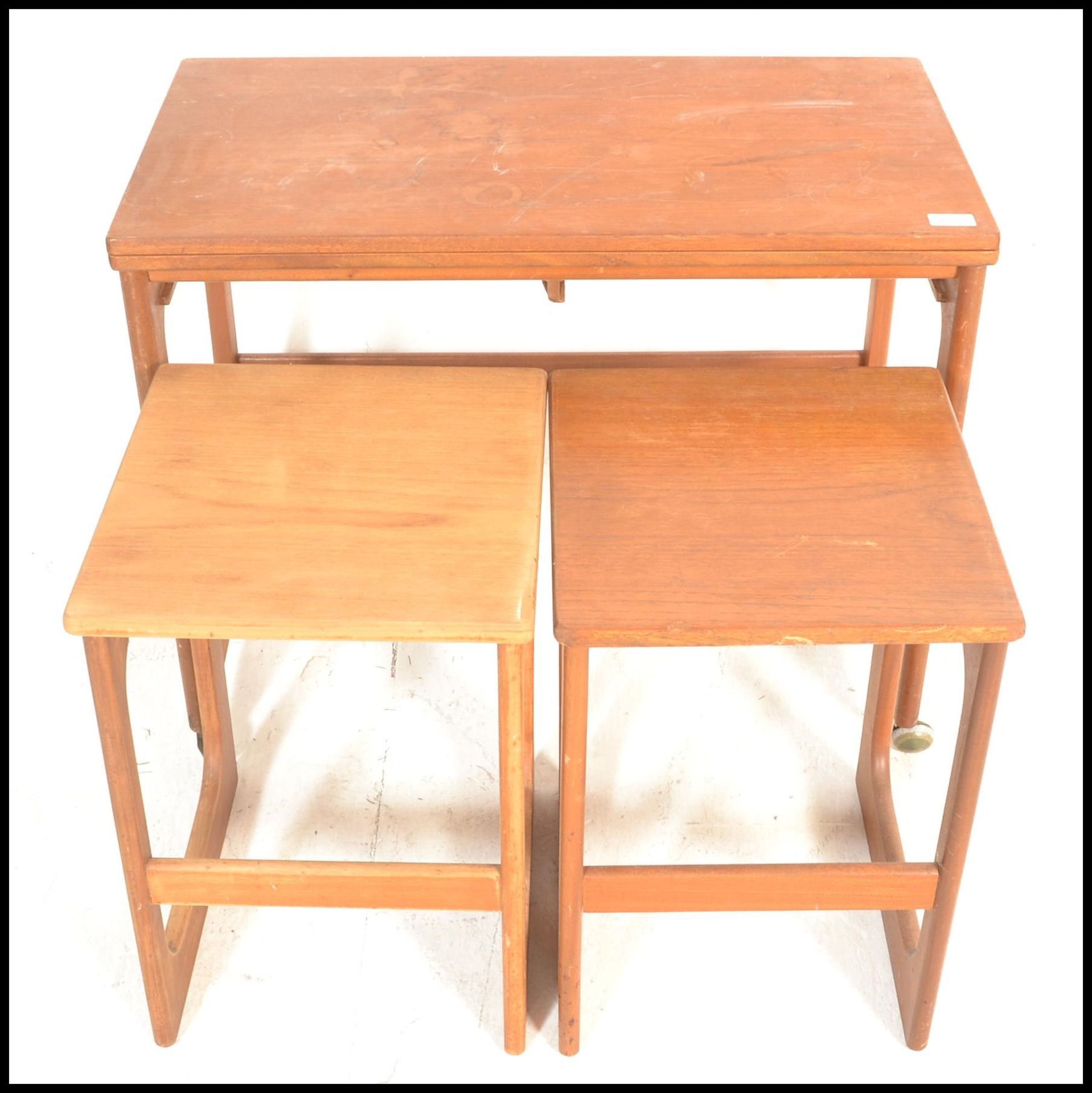 A vintage mid 20th Century McIntosh teak wood nest of tables with folding occasional top and 2 small - Bild 4 aus 4