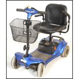 A Sterling Pearl mobility scooter having a blue painted body on four wheels with a black leather