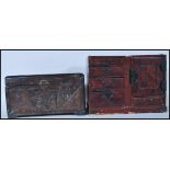A late 19th Century Chinese carved wooden table top box decorated with carved panels depicting