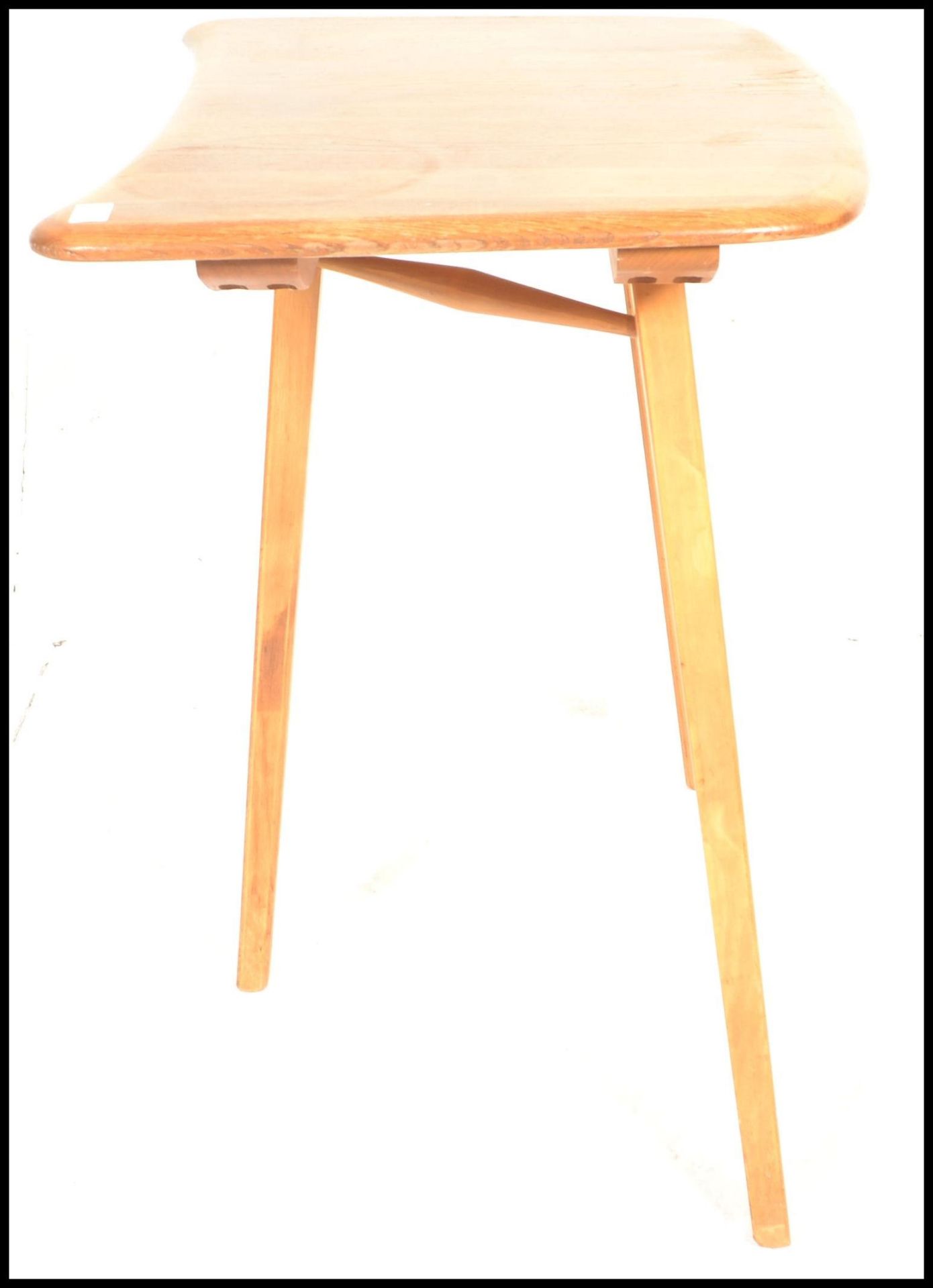 Ercol- A retro mid 20th Century beech and elm blonde Ercol table extension raised on tapering - Image 4 of 6