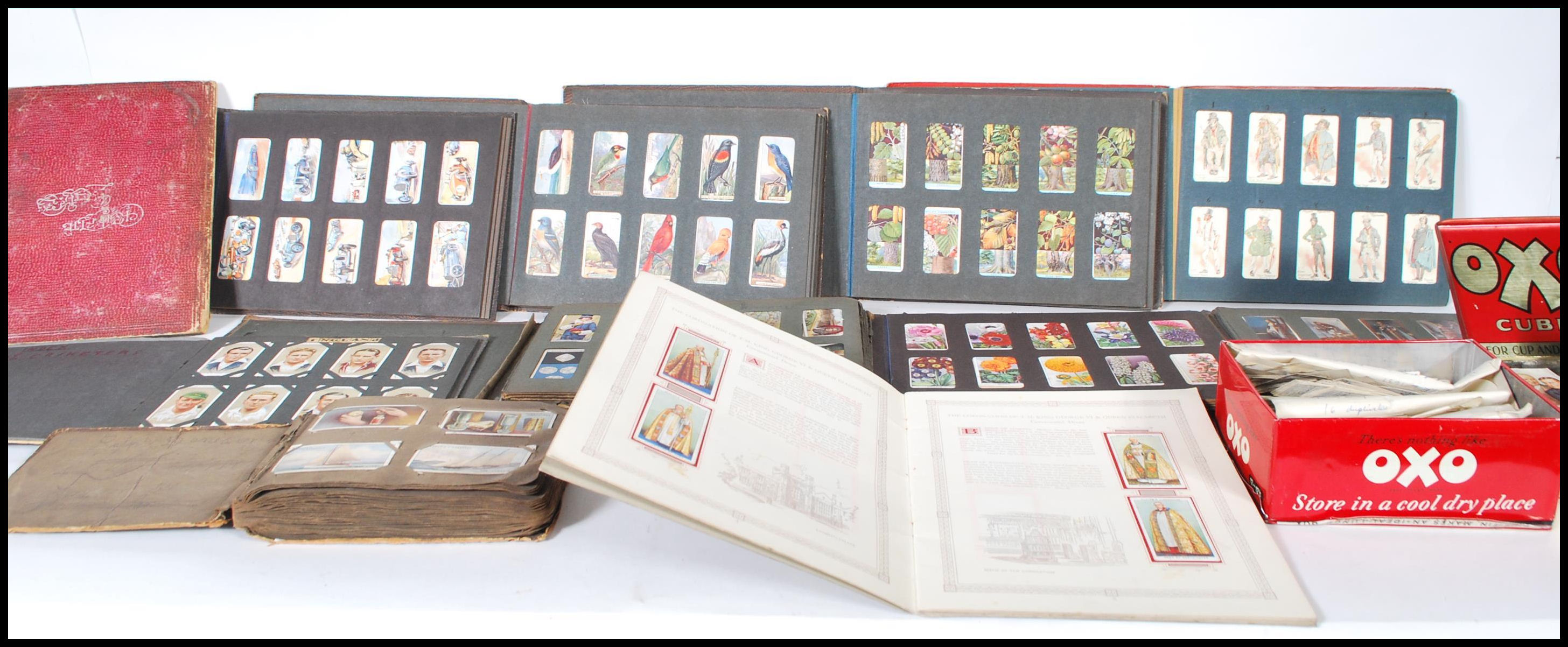A collection of vintage trade giveaway cigarette cards dating from the early 20th Century to include