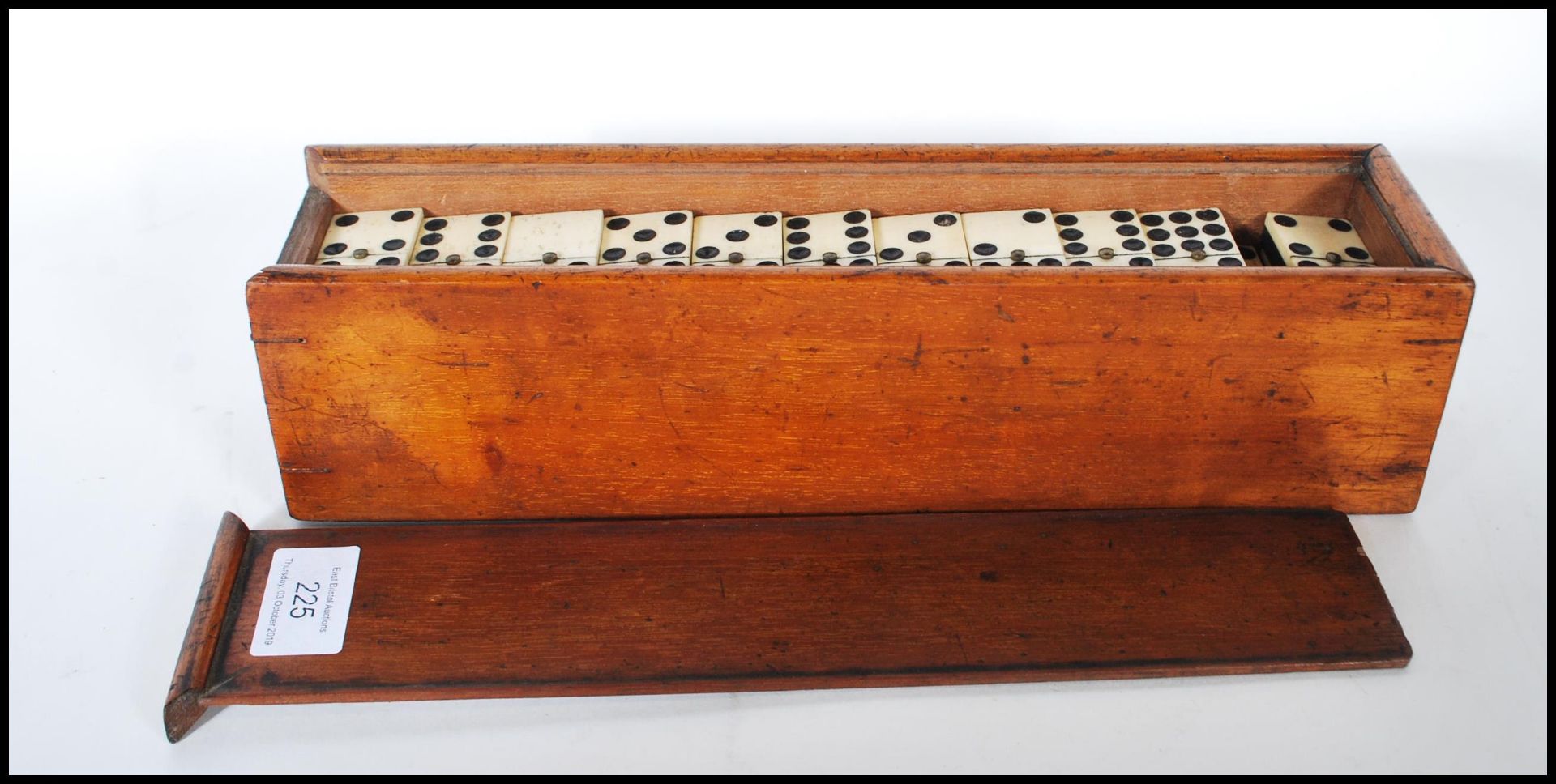 A set of 19th Century Victorian ebony and bone dominoes set within a mahogany box with a sliding - Bild 3 aus 7