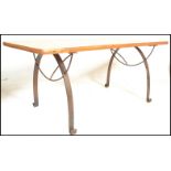 A large 20th Century plank top refectory dining table, the table top constructed from reclaimed pine