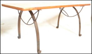 A large 20th Century plank top refectory dining table, the table top constructed from reclaimed pine