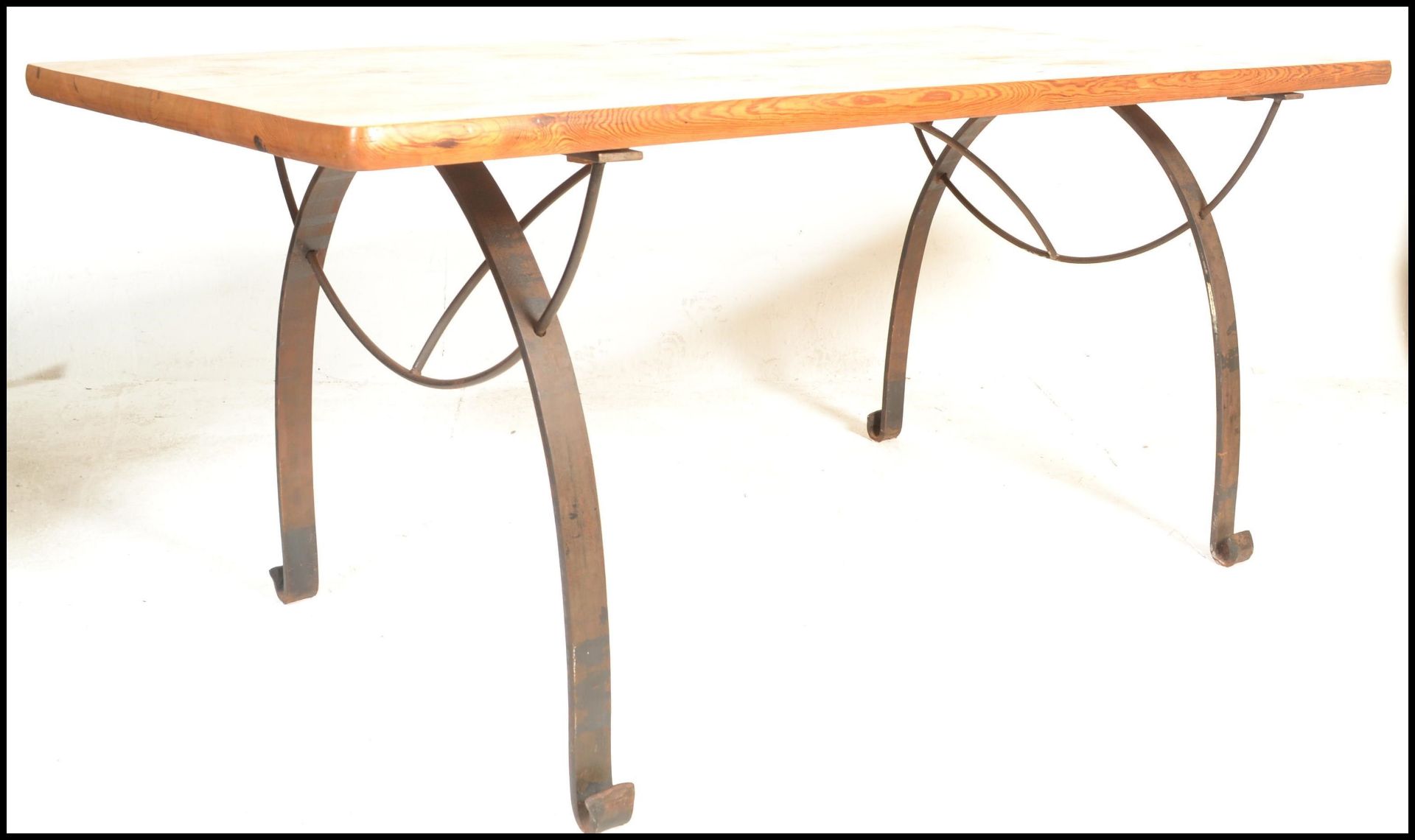A large 20th Century plank top refectory dining table, the table top constructed from reclaimed pine