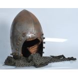 A believed 19th Century replica Medieval knights helmet with chain mail, authentic construction