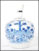 A decorative Chinese  19th Century blue and white glazed ginger jar converted in to a table lamp,