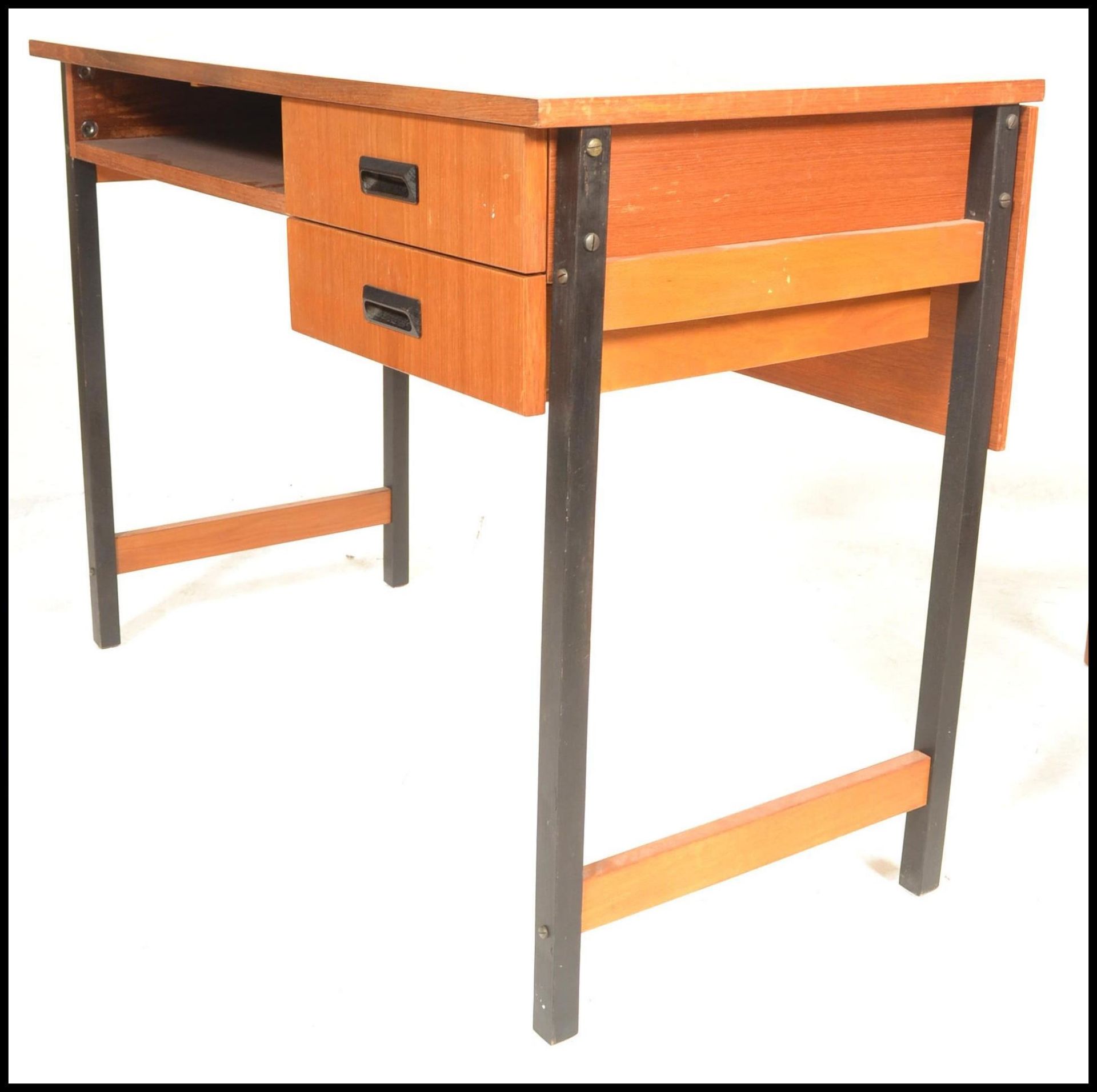 A 20th Century retro teak wood desk, raised on tubular black metal supports, two drawers to the - Bild 6 aus 6