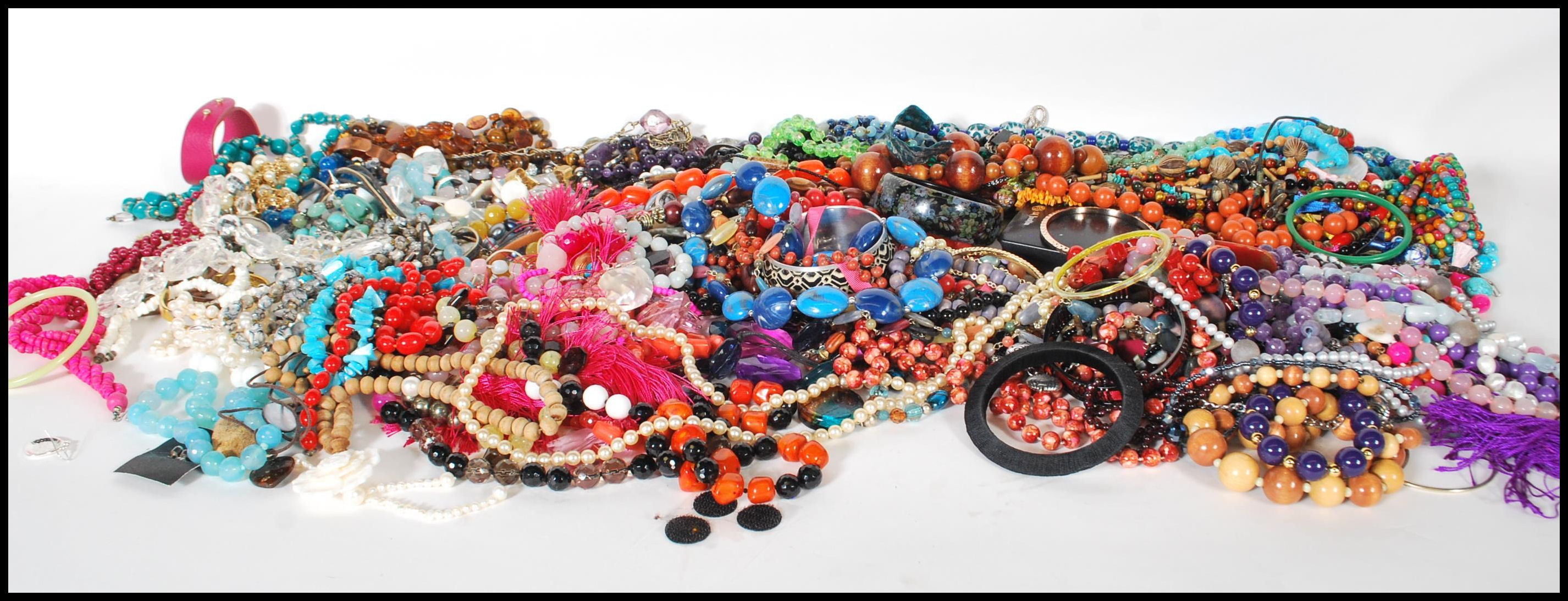 A collection of vintage and retro 20th Century costume dress jewellery to include necklaces,