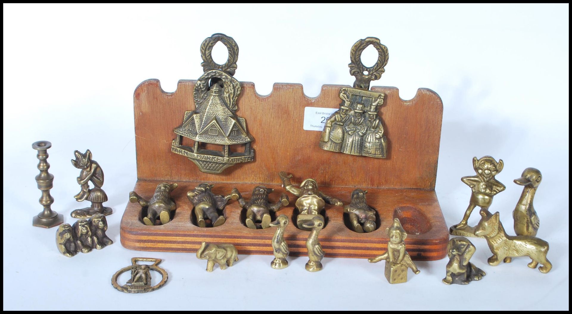 A collection of unusual brass ornamental figures to include mythical creatures, goblins, pixies
