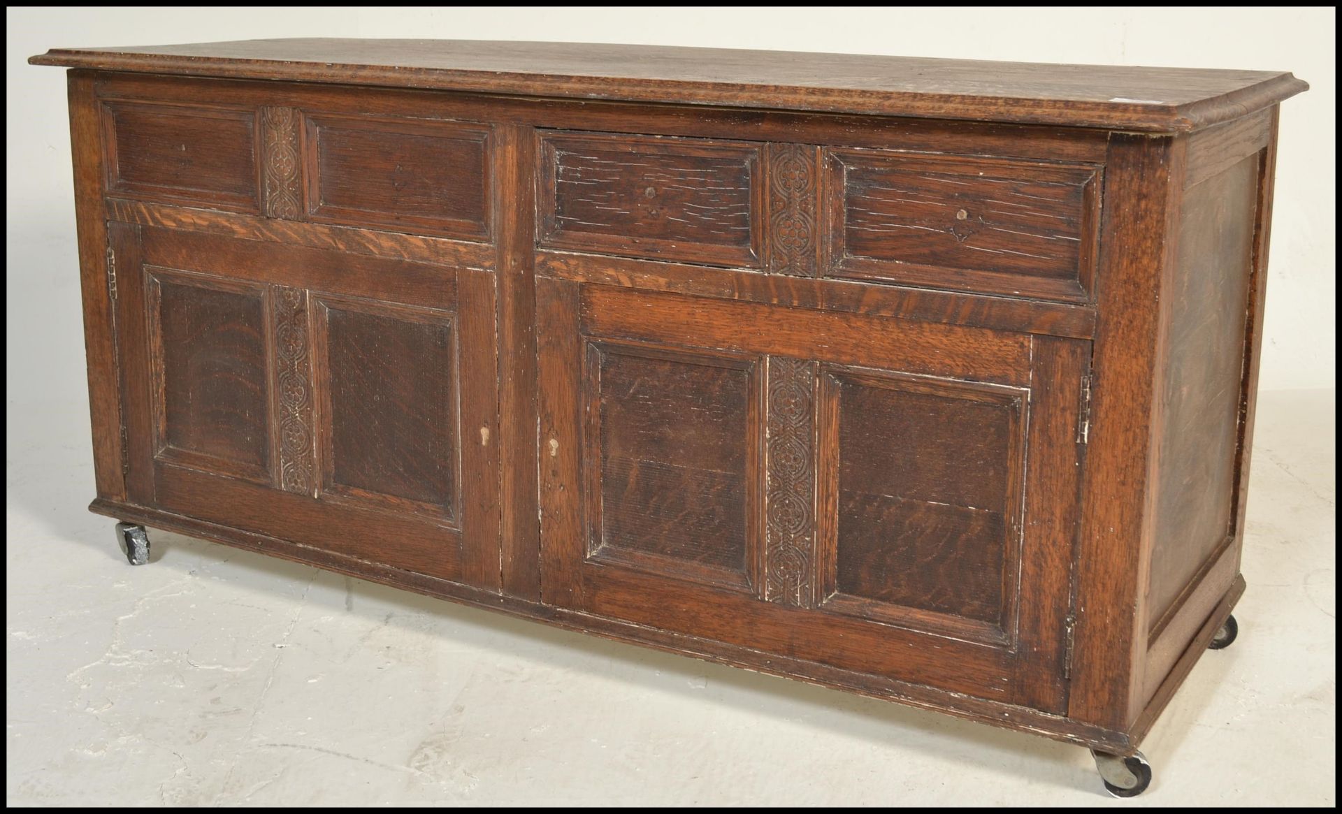 A 20th Century Jacobean revival panel oak coffer chest, panel sides and front with hinged top raised - Image 4 of 9