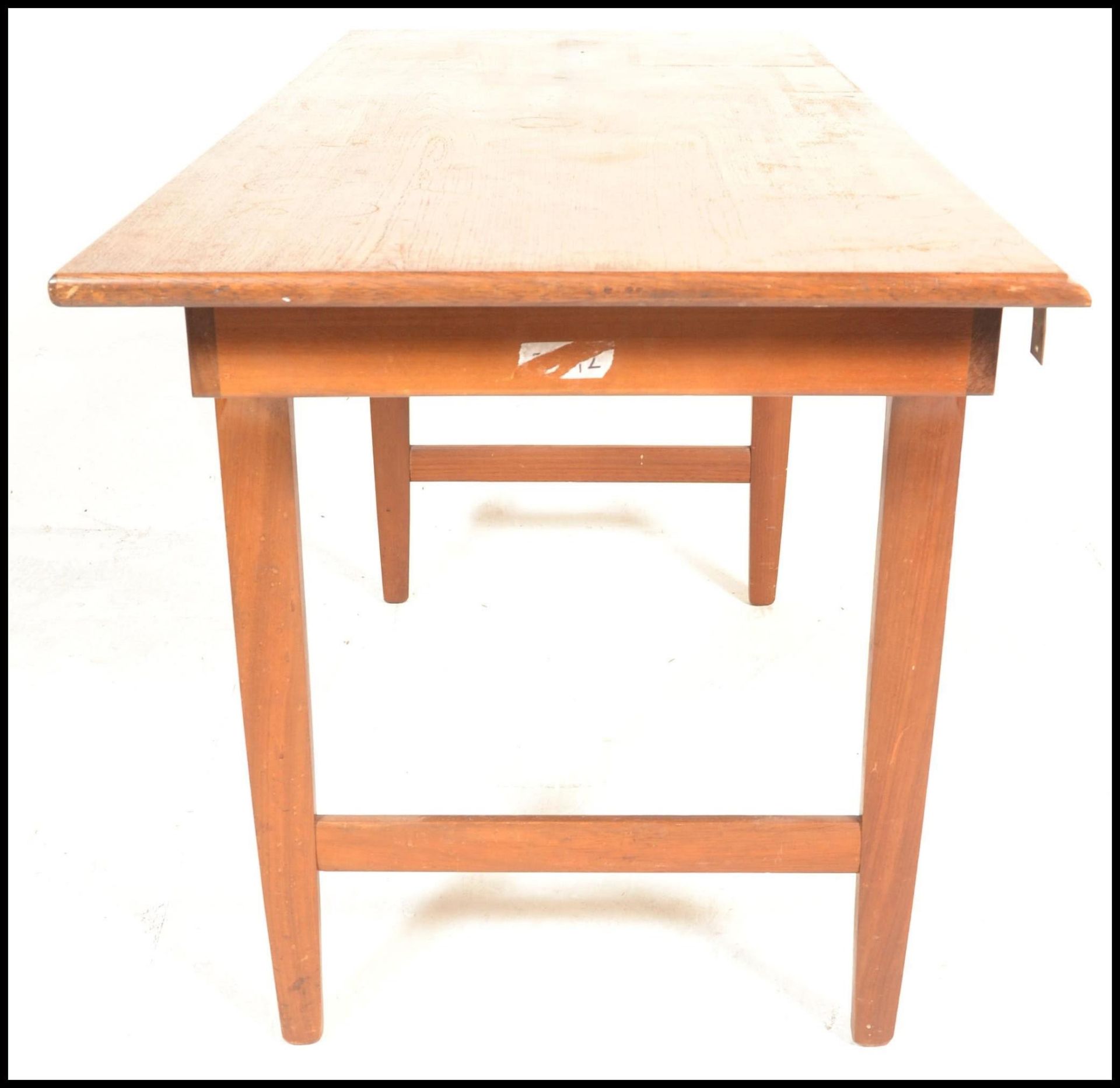 A mid century Bath Cabinet Makers teak wood Danish inspired dining table being raised on turned, - Image 7 of 7