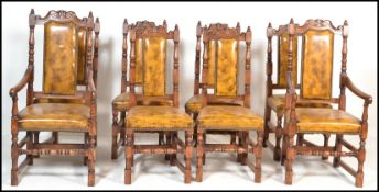 A set of eight oak and leather dining chairs, the two carvers and six carved back rail over