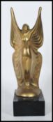 A 20th Century Art Deco style brass figure in the form of a lady wearing a butterfly wings style