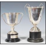 A pair of silver hallmarked trophies, one marked for Clifton Club Squash Rackets originally