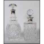 Two 20th Century cut glass crystal decanters to include a J A Campbell whiskey decanter of square