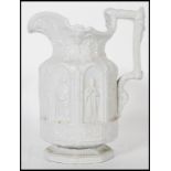 A Victorian Charles Meigh 19th Century Gothic salt glazed jug ' The Minster Jug ', circa 1840 having