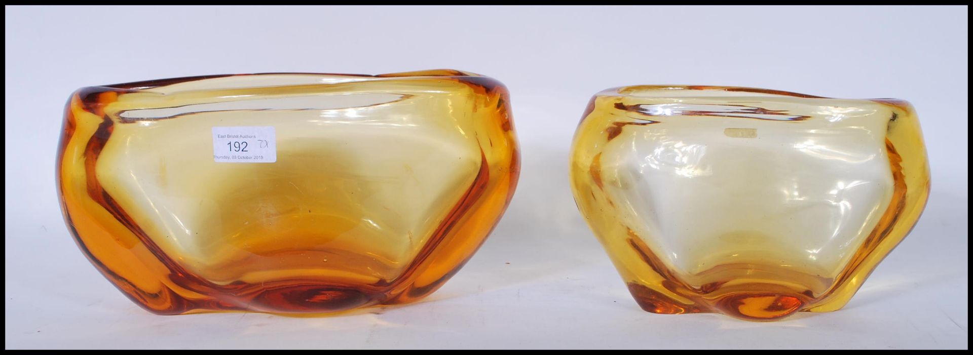 Two vintage retro amber glass vases of organic ovular form in the manner of Miloslav Klinger for