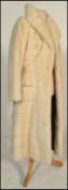 A vintage 20th Century well tailored ladies full length white mink coat bearing a label for