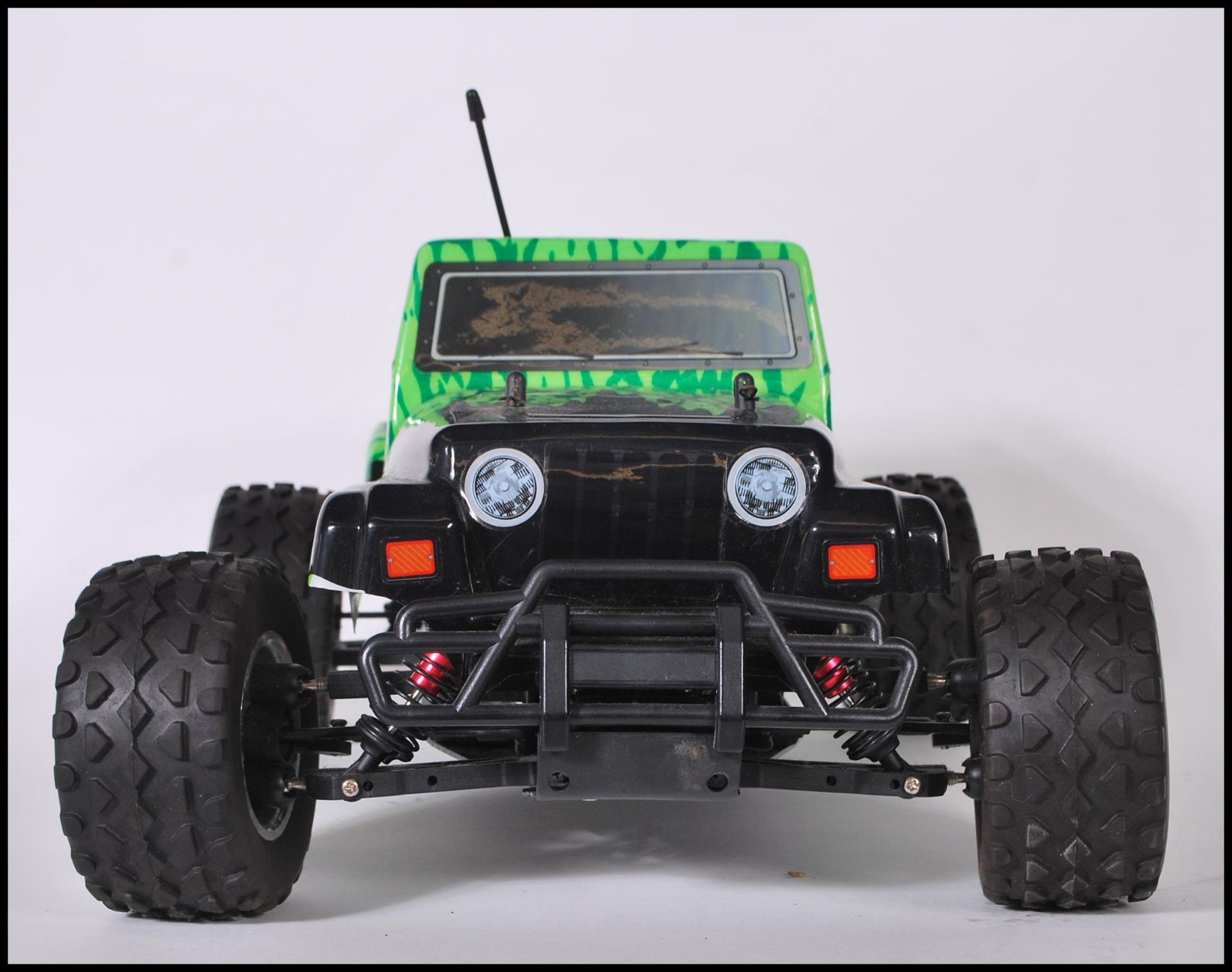 A contemporary Ranger 4WD remote control car complete with shell and the engine components etc - Image 2 of 8