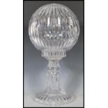 A 20th Century Waterford crystal two part table lamp with slice decoration, comprising a spherical
