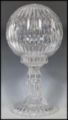 A 20th Century Waterford crystal two part table lamp with slice decoration, comprising a spherical