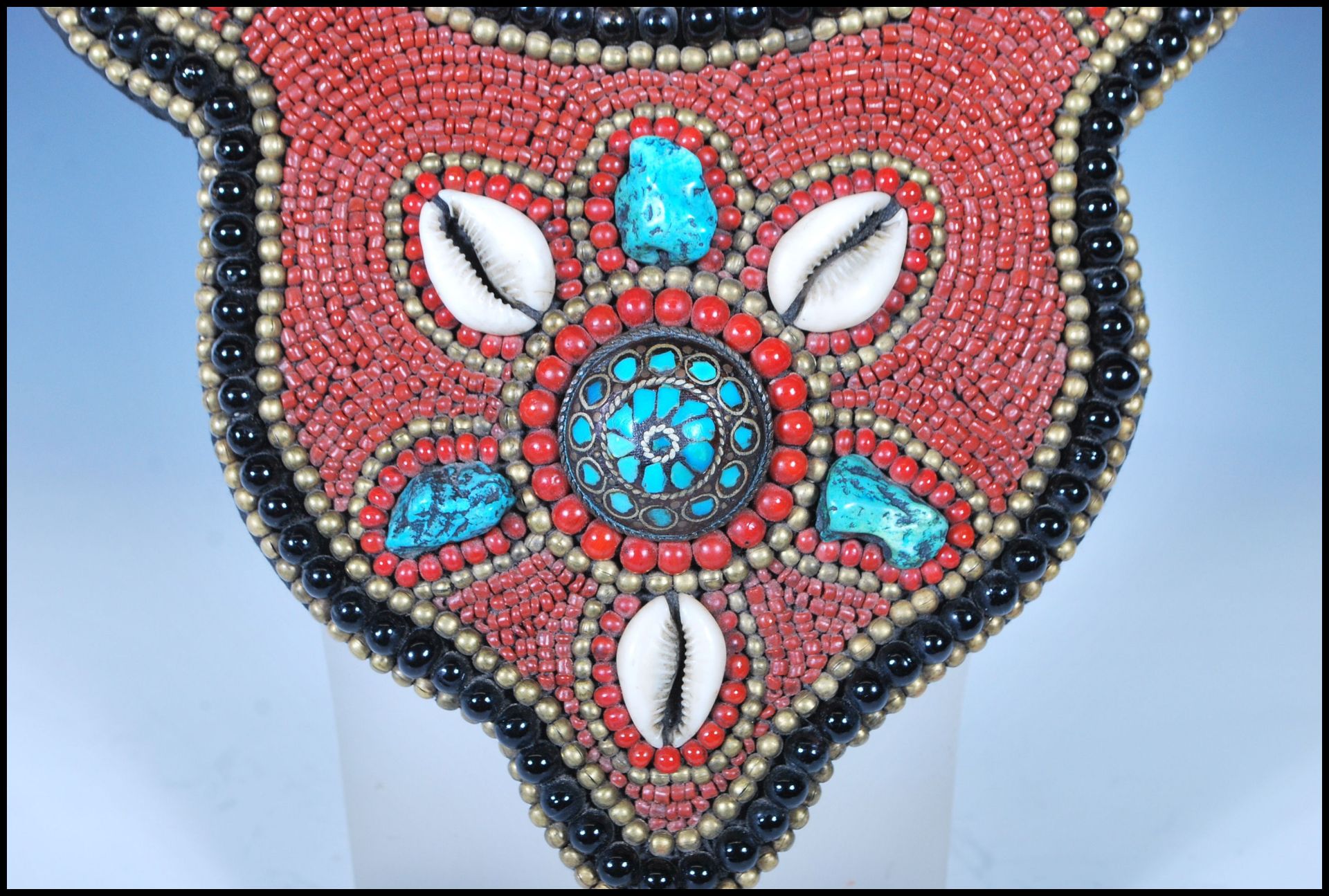 A 20th Century Tibetan tribal collar necklace constructed from a fabric panel stitched with red - Image 10 of 17