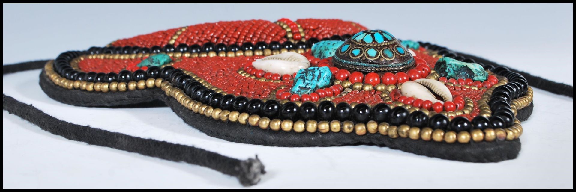 A 20th Century Tibetan tribal collar necklace constructed from a fabric panel stitched with red - Image 15 of 17