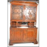 An exceptional late 19th Century solid mahogany buffet de corps / library bookcase cabinet. Raised