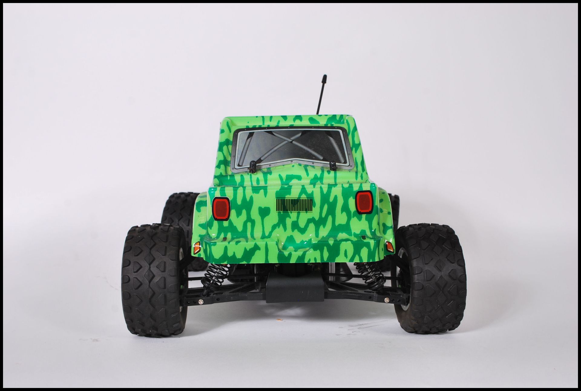 A contemporary Ranger 4WD remote control car complete with shell and the engine components etc - Image 4 of 8