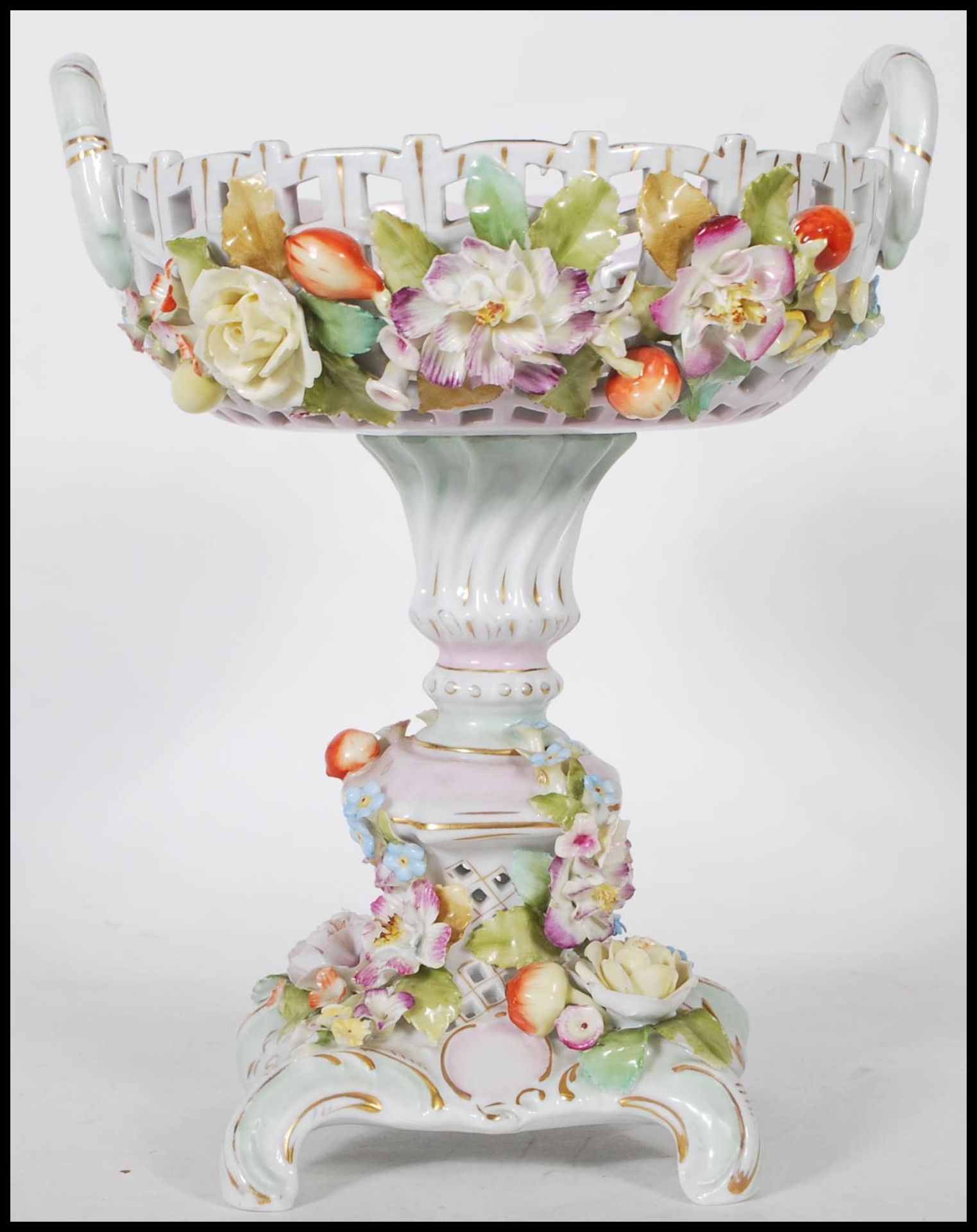 A 19th century / early 20th century Sitzendorf floral encrusted centrepiece tazza. The base with