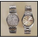 A vintage retro 20th Century stainless steel Seiko 5 Automatic wrist watch, silvered dial, baton