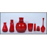 A selection of 20th Century vintage retro red ruby studio glass vases to include a Borsk olive style