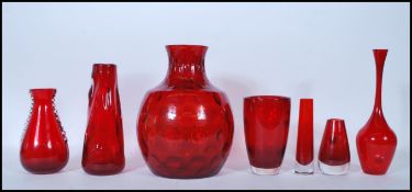 A selection of 20th Century vintage retro red ruby studio glass vases to include a Borsk olive style